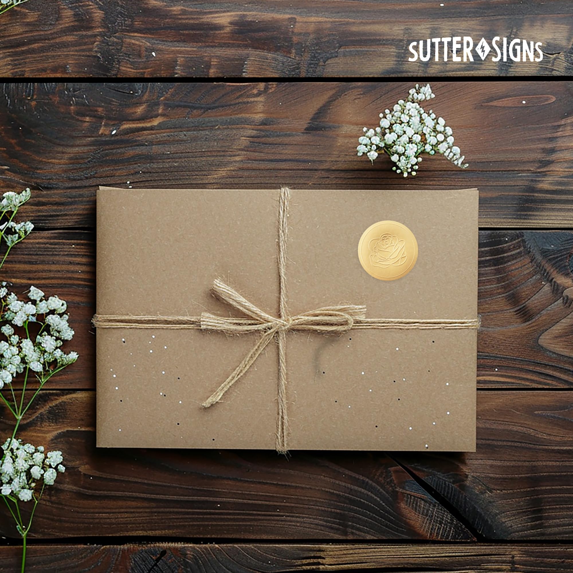Sutter Signs save‑the‑date stickers used on a card design