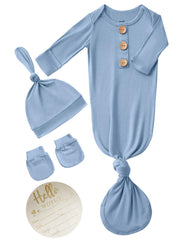SUZEL newborn knotted gown in dusty blue with announcement sign for newborn portraits