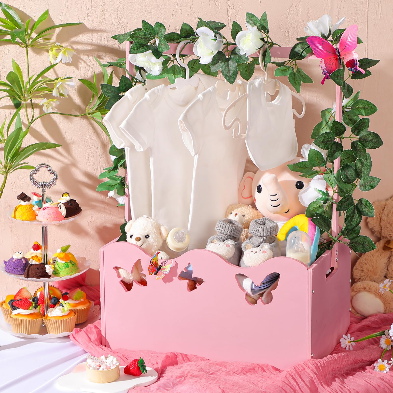 Suzile pink crate holding diapers and toys, flexible storage for busy parents.