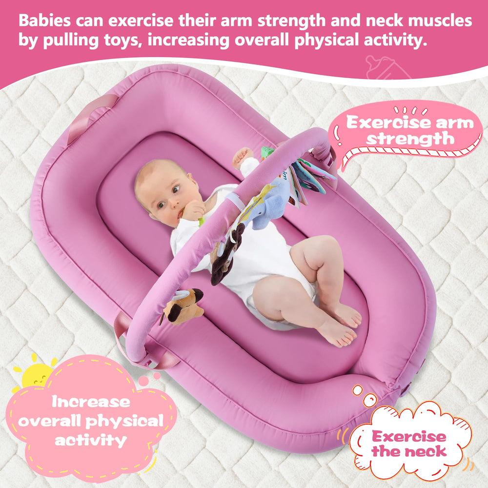 Swaathani baby lounger with toys encourages tactile play.