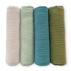 SwaddleDesigns Oceana muslin swaddle blanket folded, showcasing soft texture and versatility.