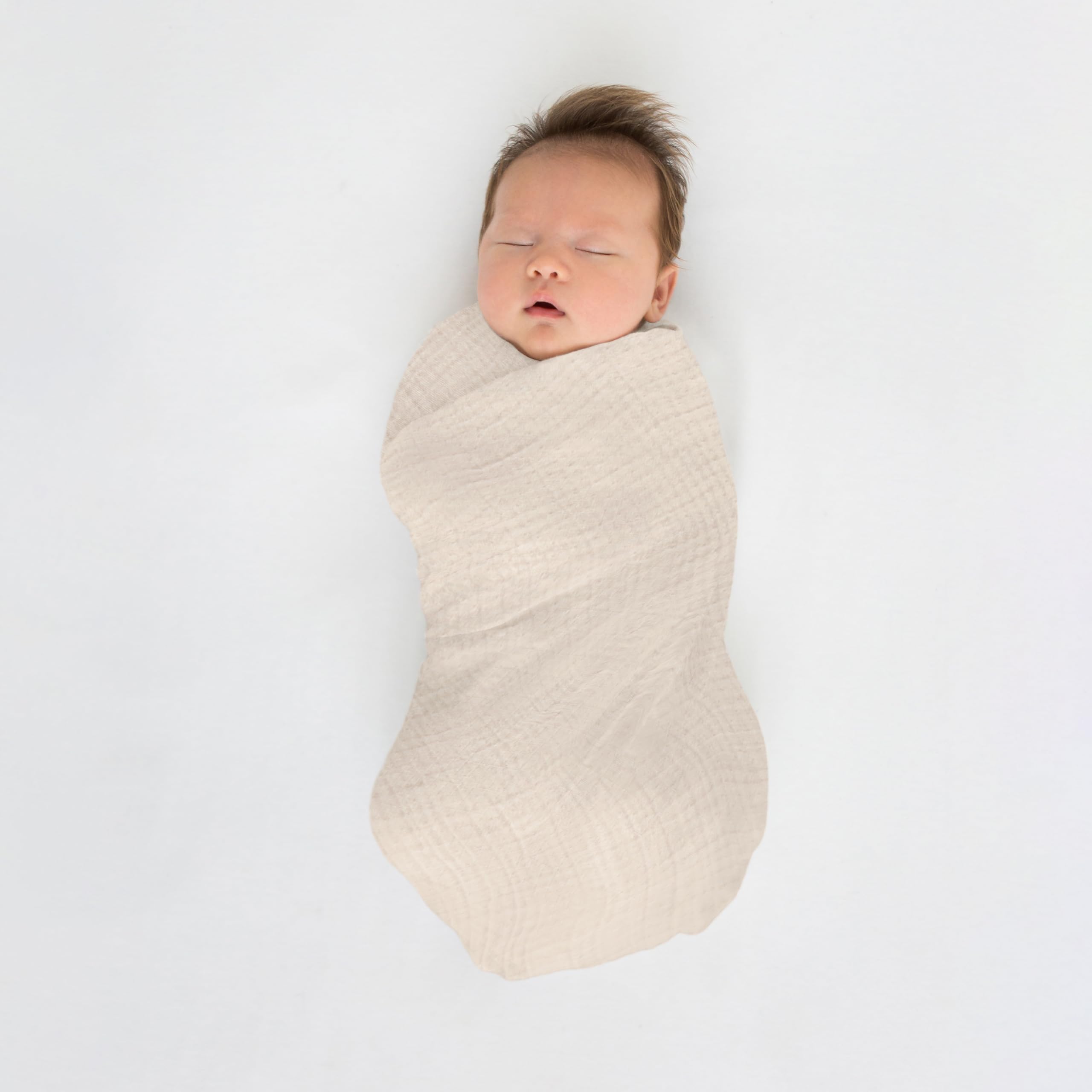 SwaddleDesigns Oceana muslin swaddle blanket as privacy throw during feeds.