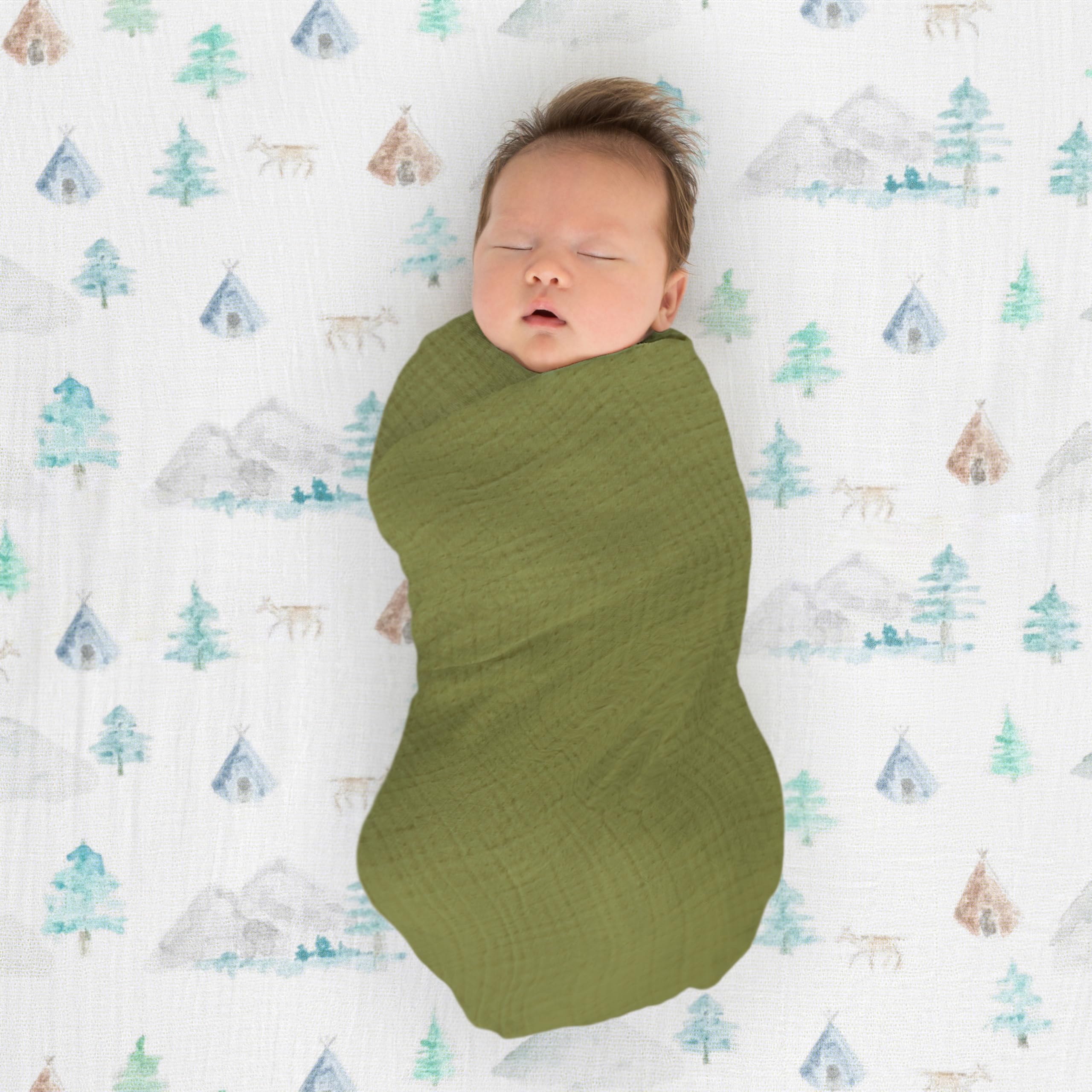 SwaddleDesigns Oceana muslin swaddle blanket used as sunshield outdoors.