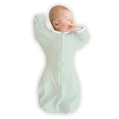 SwaddleDesigns arm-up sleeve design promotes self-soothing and safer rollover transitions.