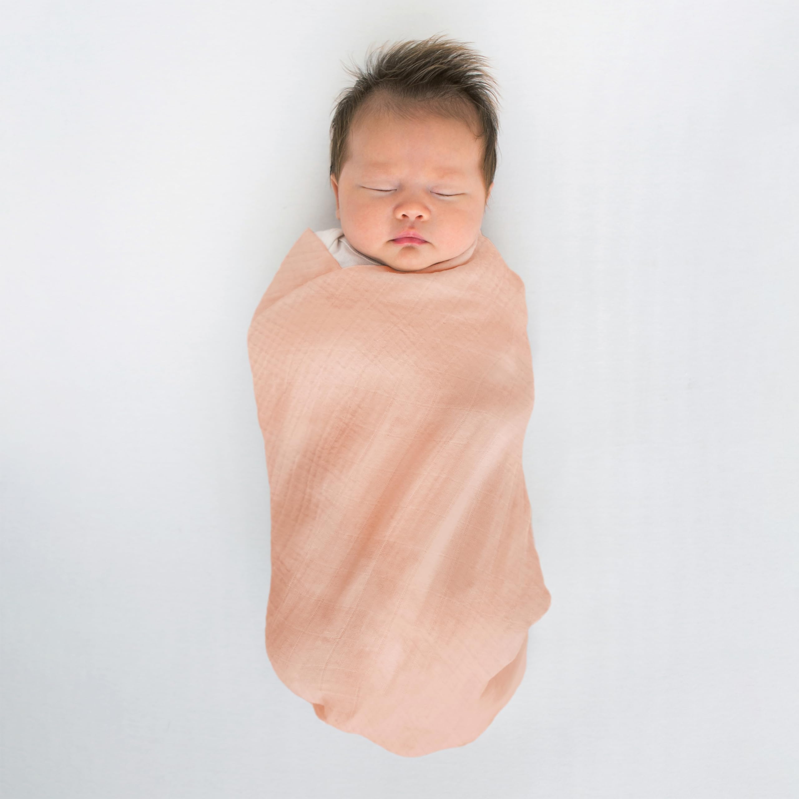 SwaddleDesigns Peach Blush blanket used during tummy time for comfort