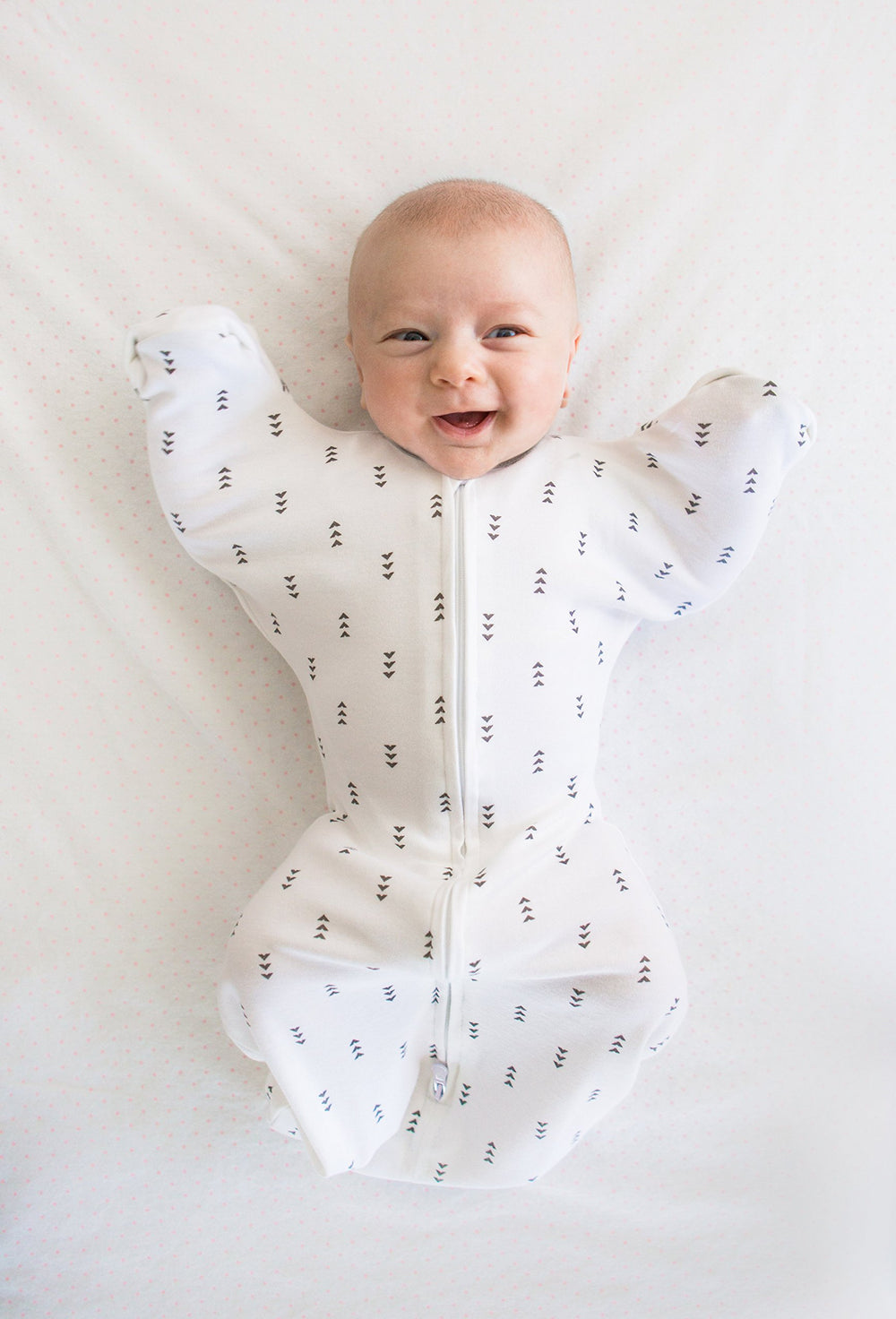 SwaddleDesigns Transitional Swaddle Sack not a tight wrap for comfortable transition.