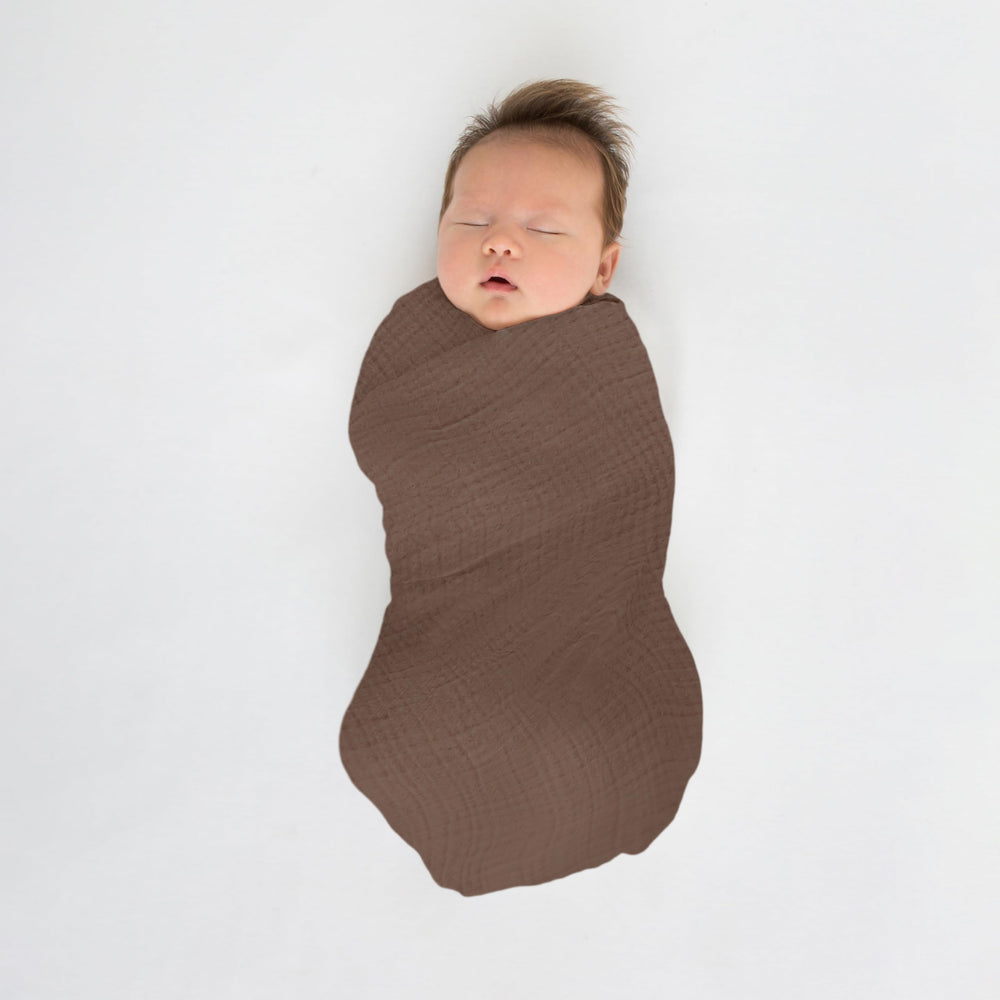 SwaddleDesigns watercolor sunny days privacy throw demonstrates versatility during feeding
