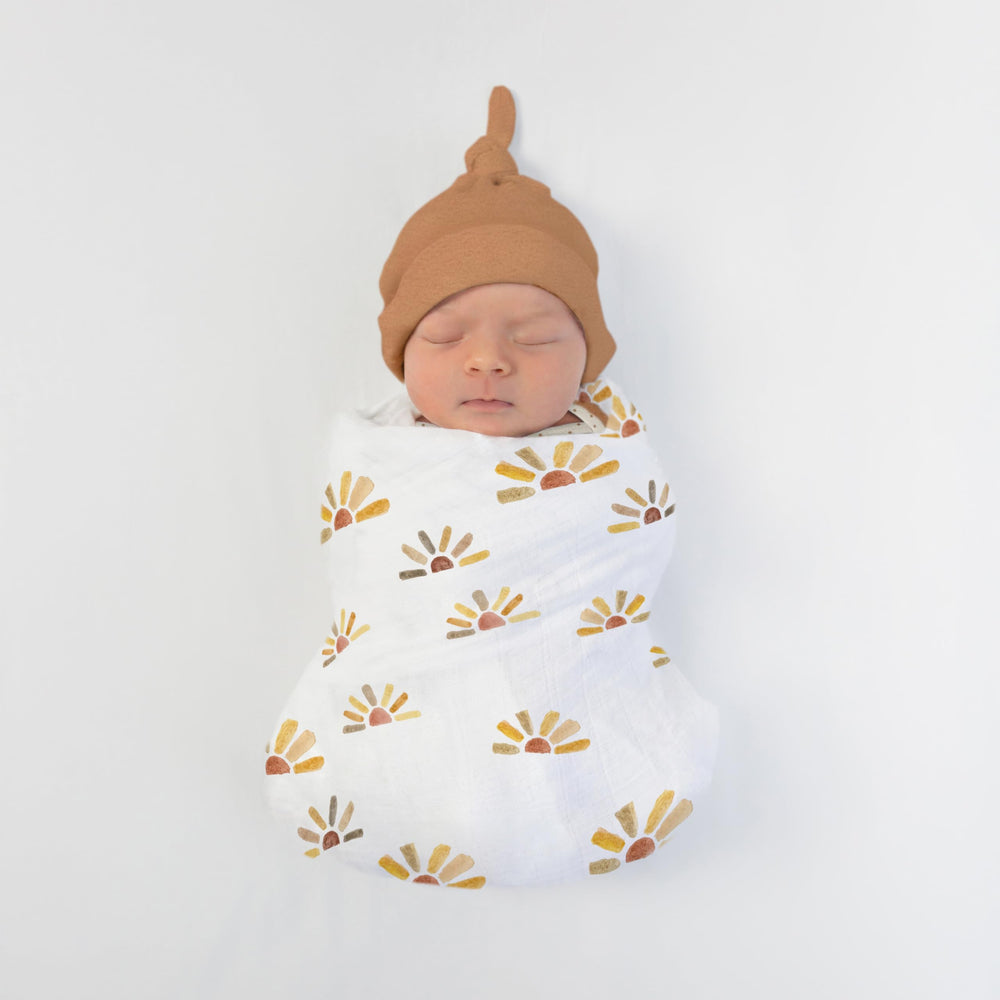 SwaddleDesigns watercolor sunny days tummy time scene emphasizes breathable comfort