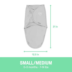 SwaddleMe Dino Tracks wings adjustment close-up shows secure, adjustable swaddle for newborns.