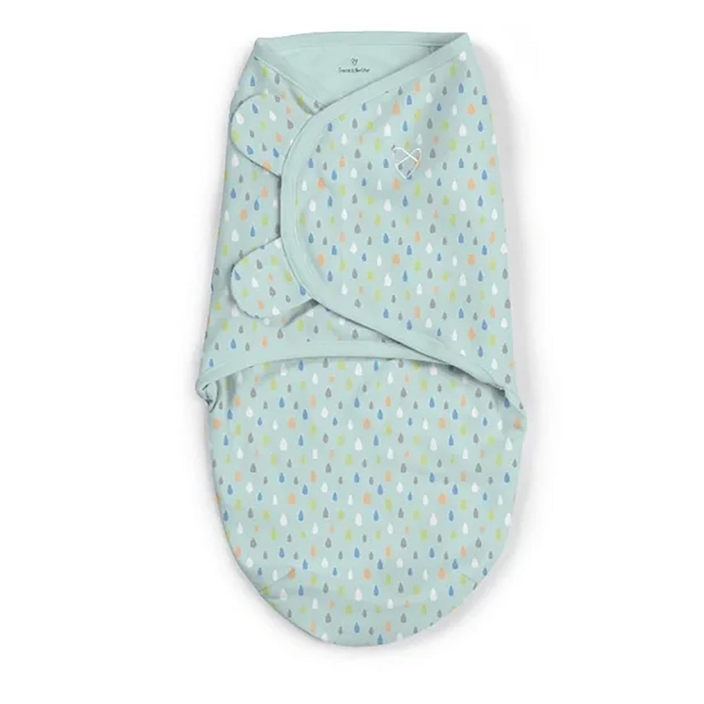 Baby inside SwaddleMe Original Swaddle for soothing snug wrap