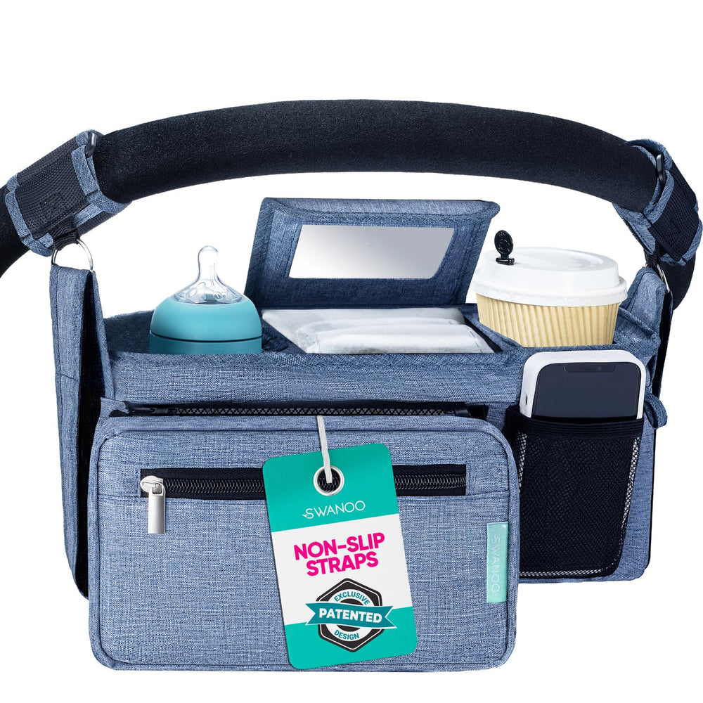 Swanoo stroller caddy roll-down mesh bag adds extra storage space.