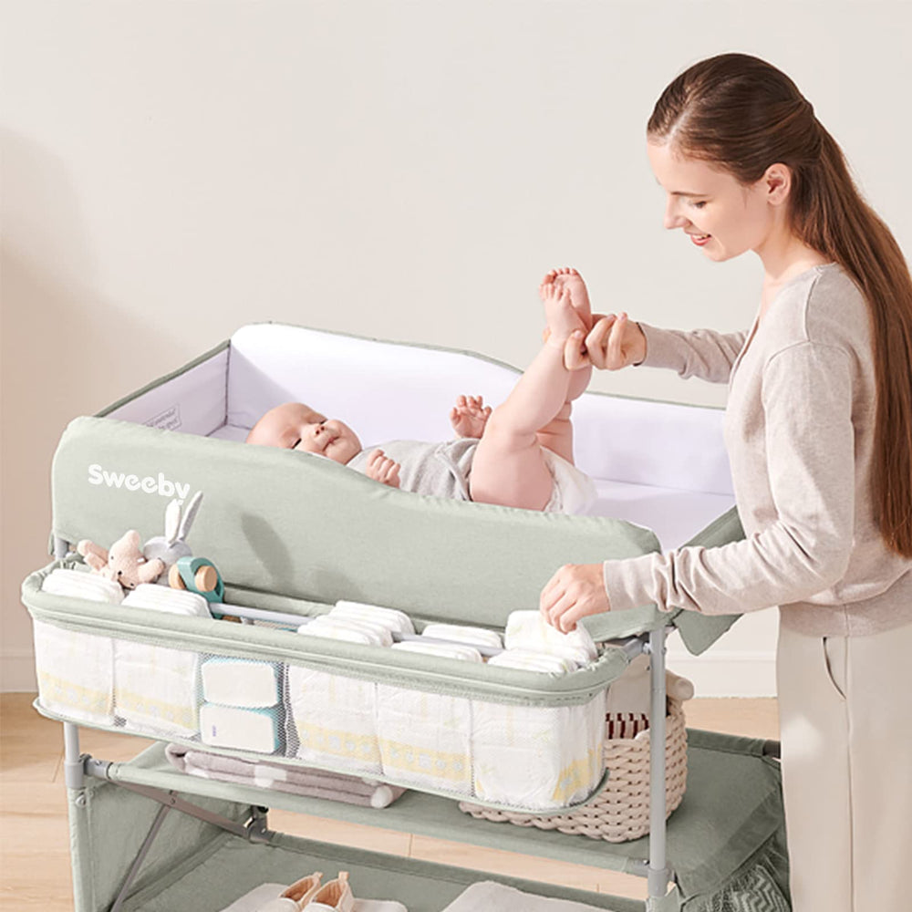 Sweeby portable baby changing table in use as a safe, organized changing station.