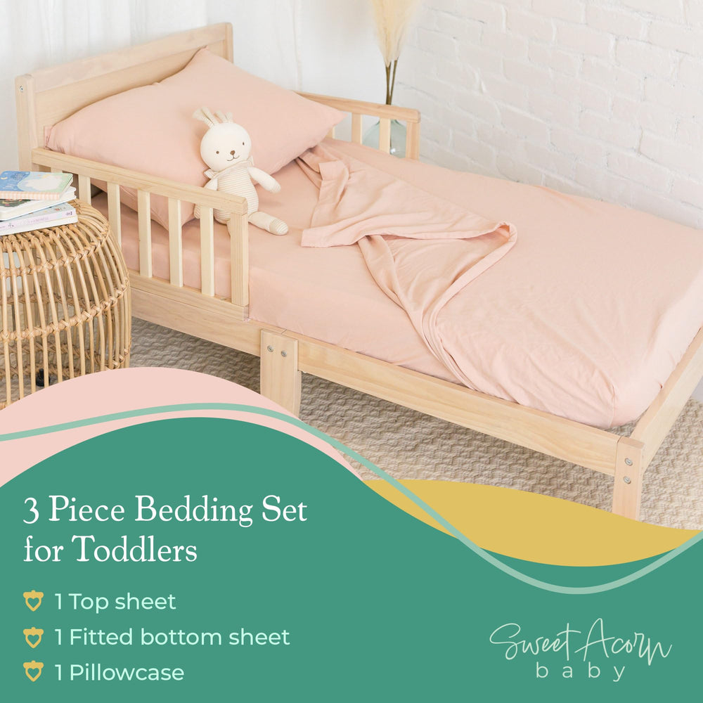 Sweet Acorn crib-fit detail shows secure 9x28x52 inch coverage for convertible cribs.