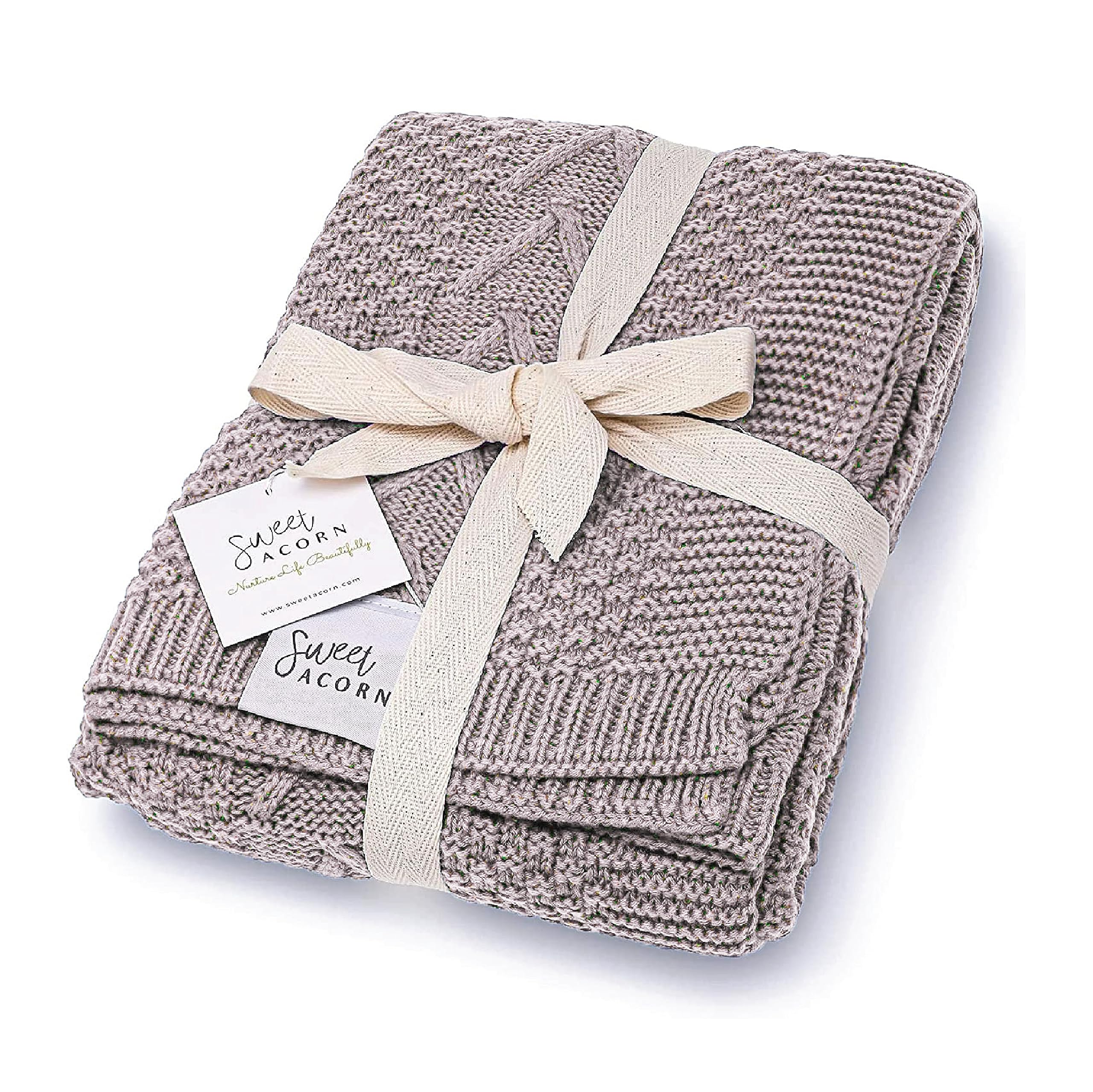 Sweet Acorn knit blanket closeup highlights chevron cables for cozy warmth