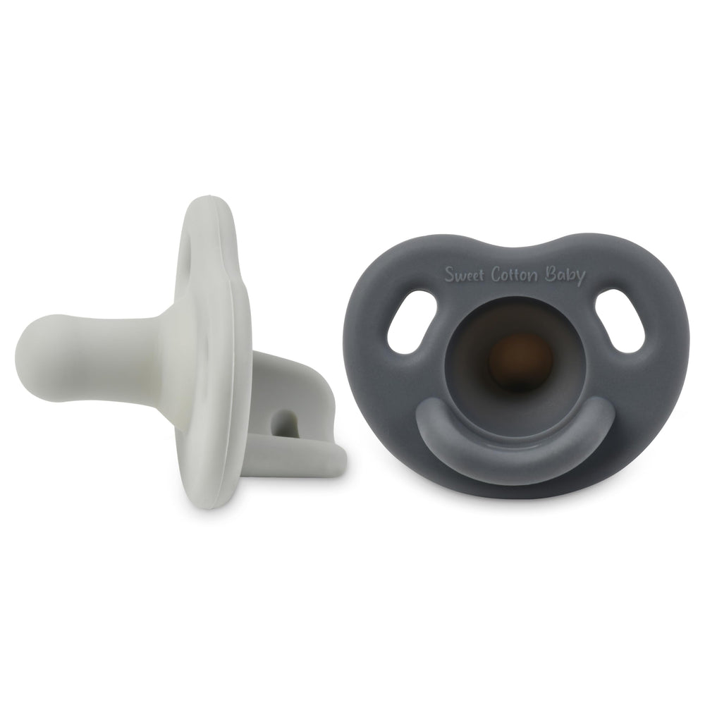 Sweet Cotton Baby soft silicone pacifier in newborn style supports natural latch during soothing.
