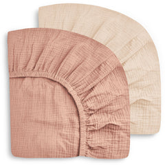 Sweet Dolphin 2-pack muslin crib sheets in packaging, showing value and easy setup.
