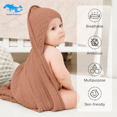 Sweet Dolphin muslin texture close-up emphasizes soft, durable 6-layer fabric for everyday bath time