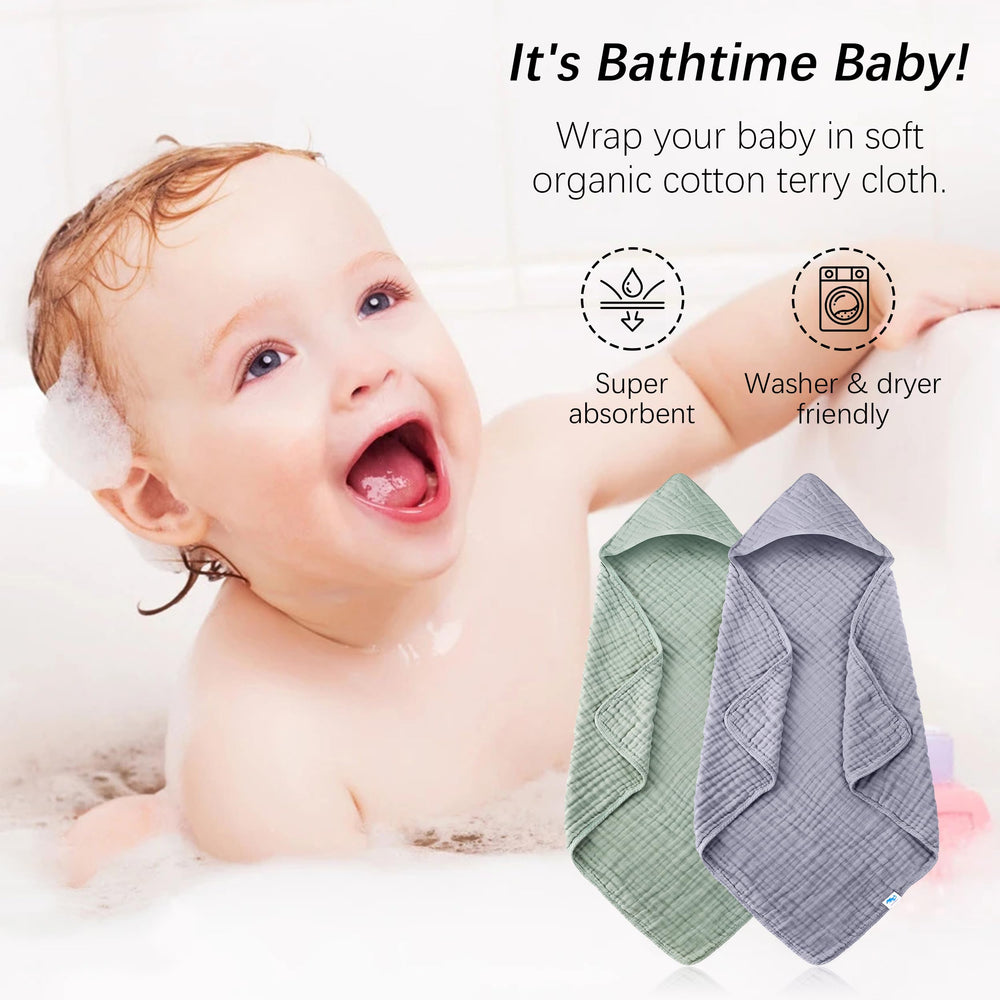 Sweet Dolphin Muslin Hooded Towel multiuse design demonstrates swaddle and blanket versatility.