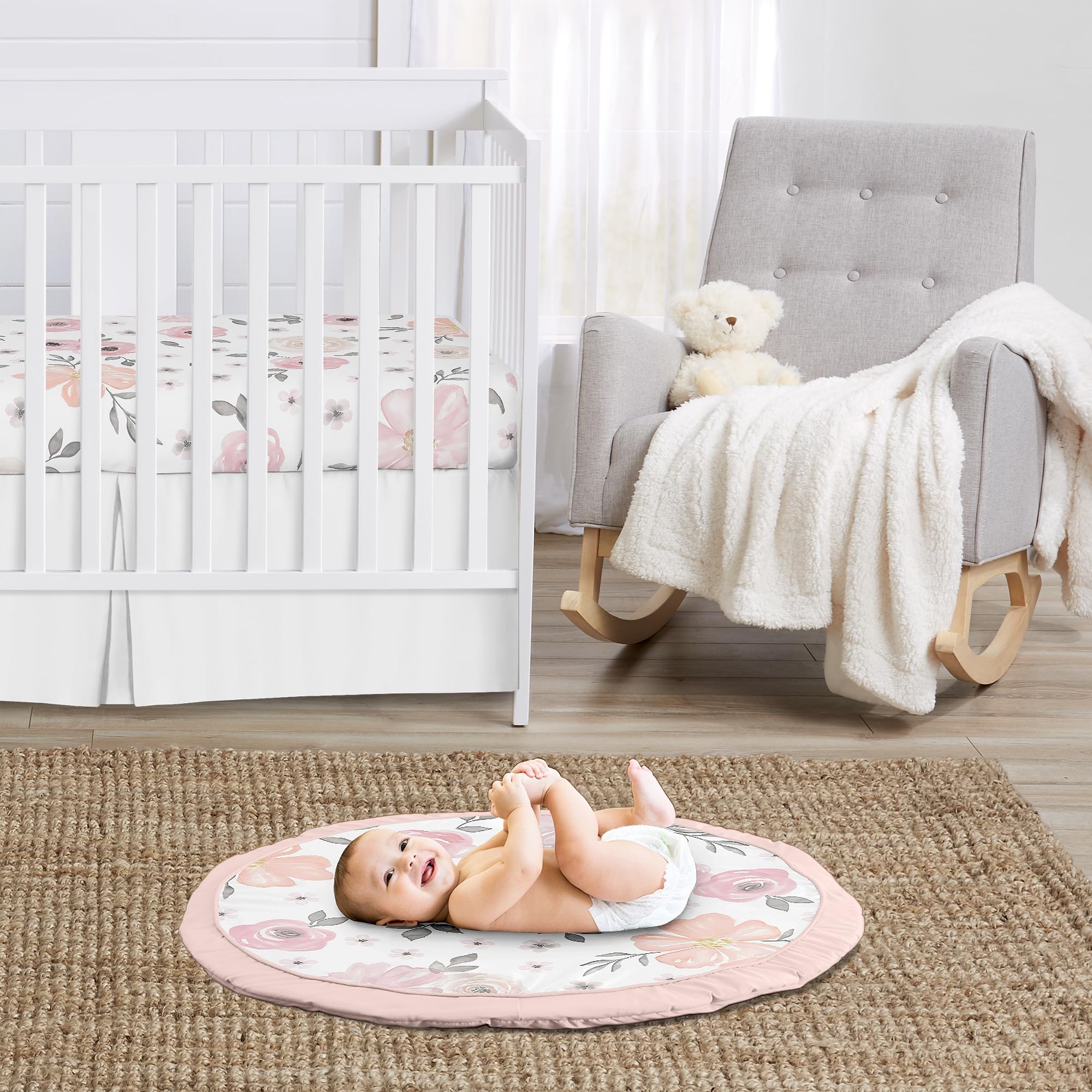 Sweet Jojo Designs watercolor floral play mat enhances nursery decor and coordinates with bedding.