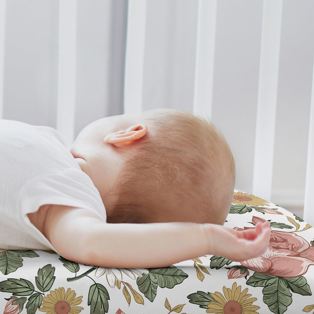Sweet Jojo Designs bassinet sheets fit oval and hourglass mattresses securely with premium elastic