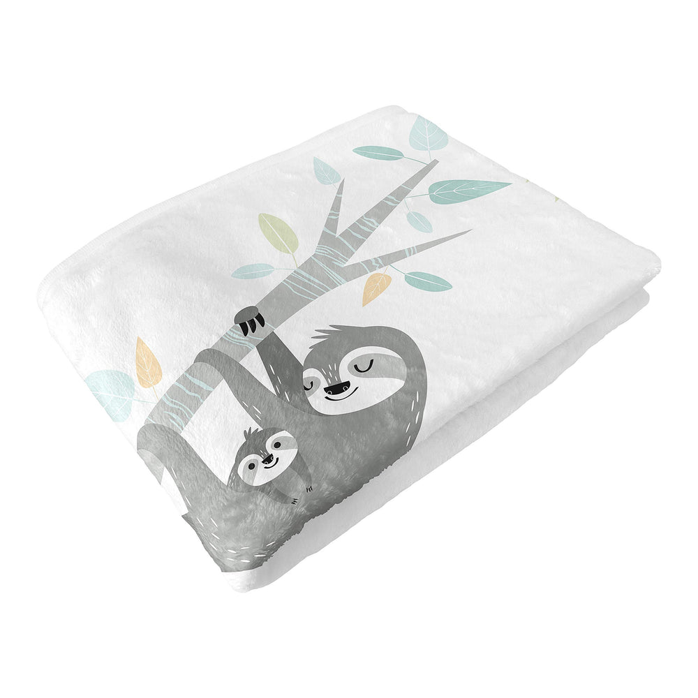 Sweet Jojo Designs blue jungle sloth room decor for nursery styling.