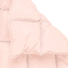 Sweet Jojo Designs blush pink crib comforter closeup fabric shows cozy texture and stitching.