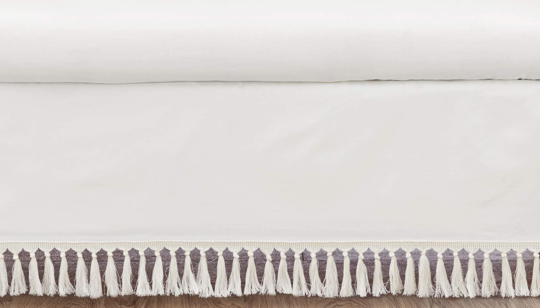 Sweet Jojo Designs boho desert sun crib skirt in ivory adds neutral nursery elegance for a calm look.