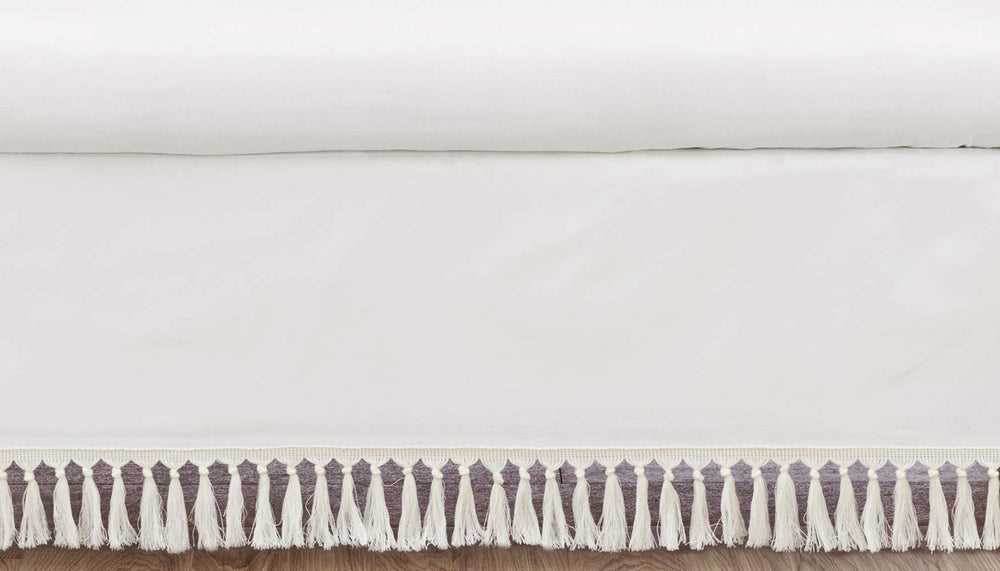 Sweet Jojo Designs boho desert sun crib skirt in ivory adds neutral nursery elegance for a calm look.