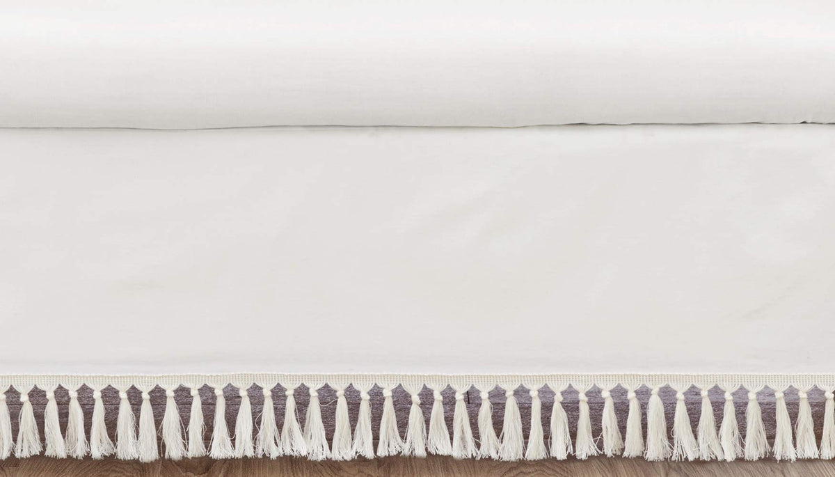 Sweet Jojo Designs boho desert sun crib skirt in ivory adds neutral nursery elegance for a calm look.