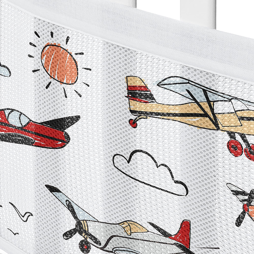 Sweet Jojo Designs breathablebaby vintage airplane crib liner-in-room sits in a calm nursery with bedding