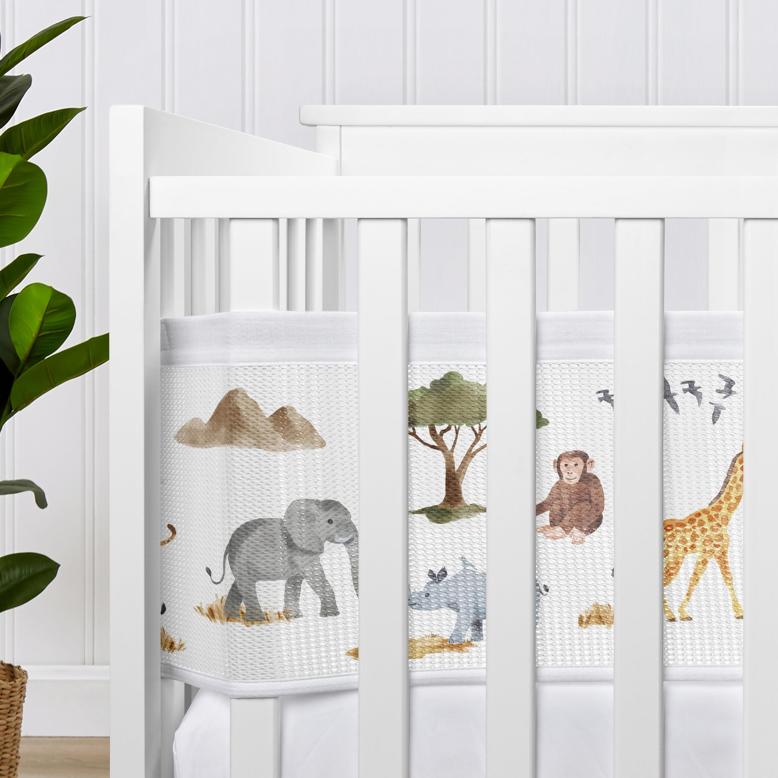 Sweet Jojo Designs breathable mesh crib liner featuring monkeys in safari print for safe sleep.