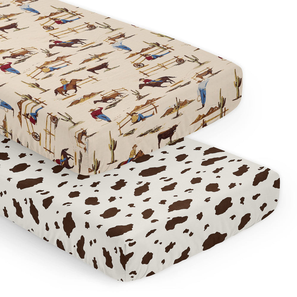 Sweet Jojo Designs cow-print crib sheets with snug-fit for standard cribs