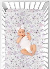 Sweet Jojo Designs crib sheets coordinate with lavender, pink, and grey nursery decor.