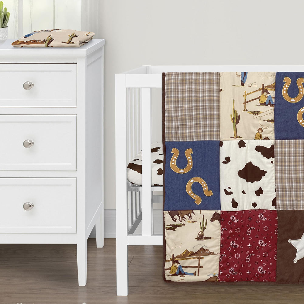Sweet Jojo Designs denim patchwork with microsuede detail enhances nursery decor.