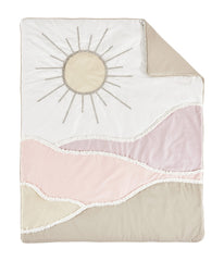 Sweet Jojo Designs desert mountains crib skirt adds color and depth to the set.