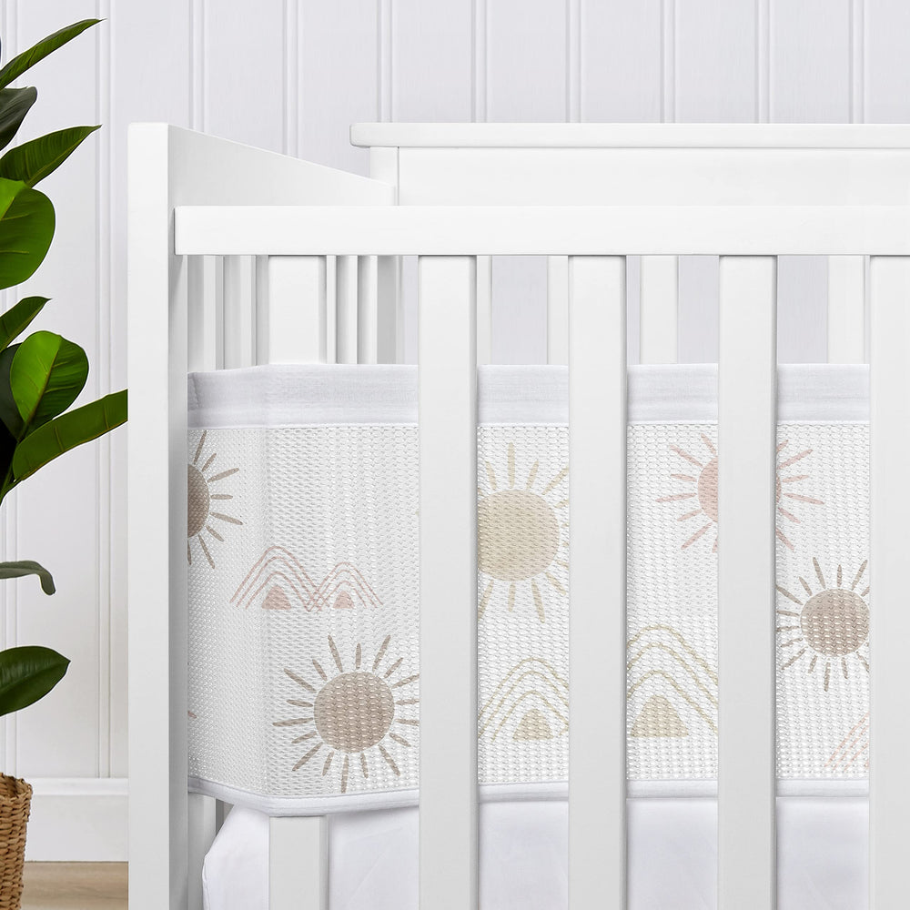 Sweet Jojo Designs desert sun installed crib demonstrates a safer, contained sleep space.
