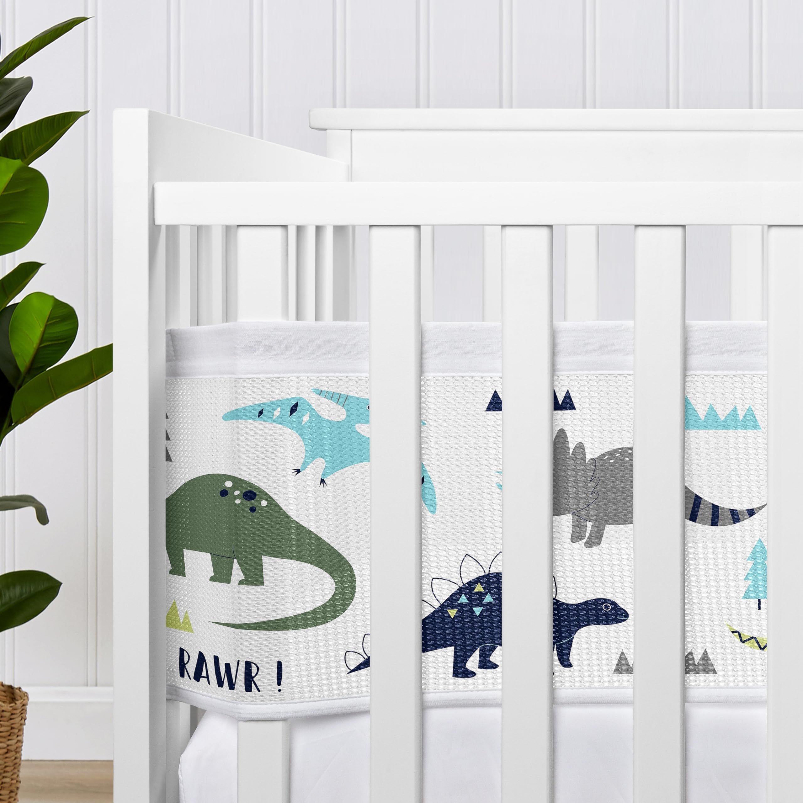 Sweet Jojo Designs dinosaur prints on dynamic liner boost visual interest while blocking gaps.