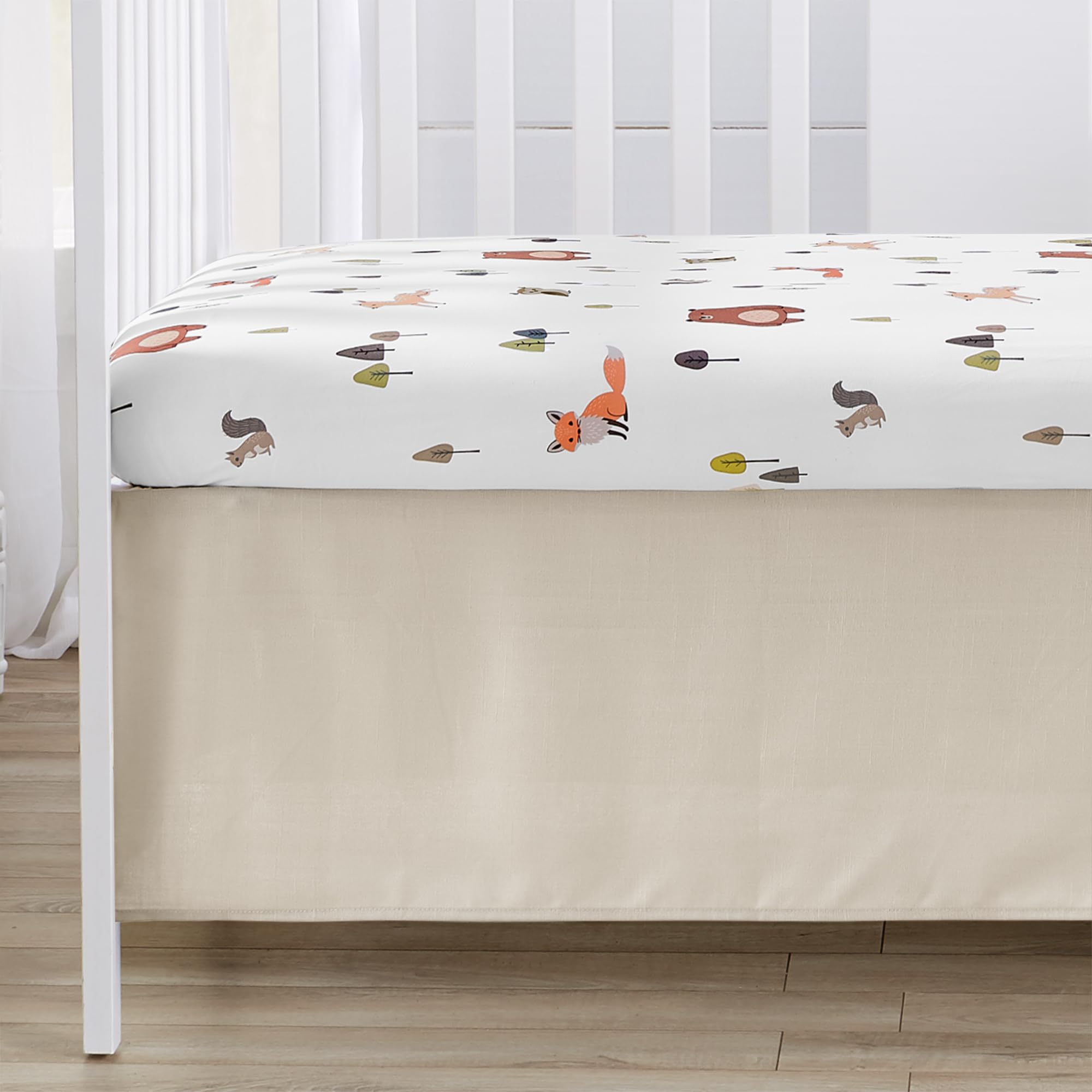 Sweet Jojo Designs forest-themed nursery palette complements gender-neutral rooms and versatile coordinating decor.
