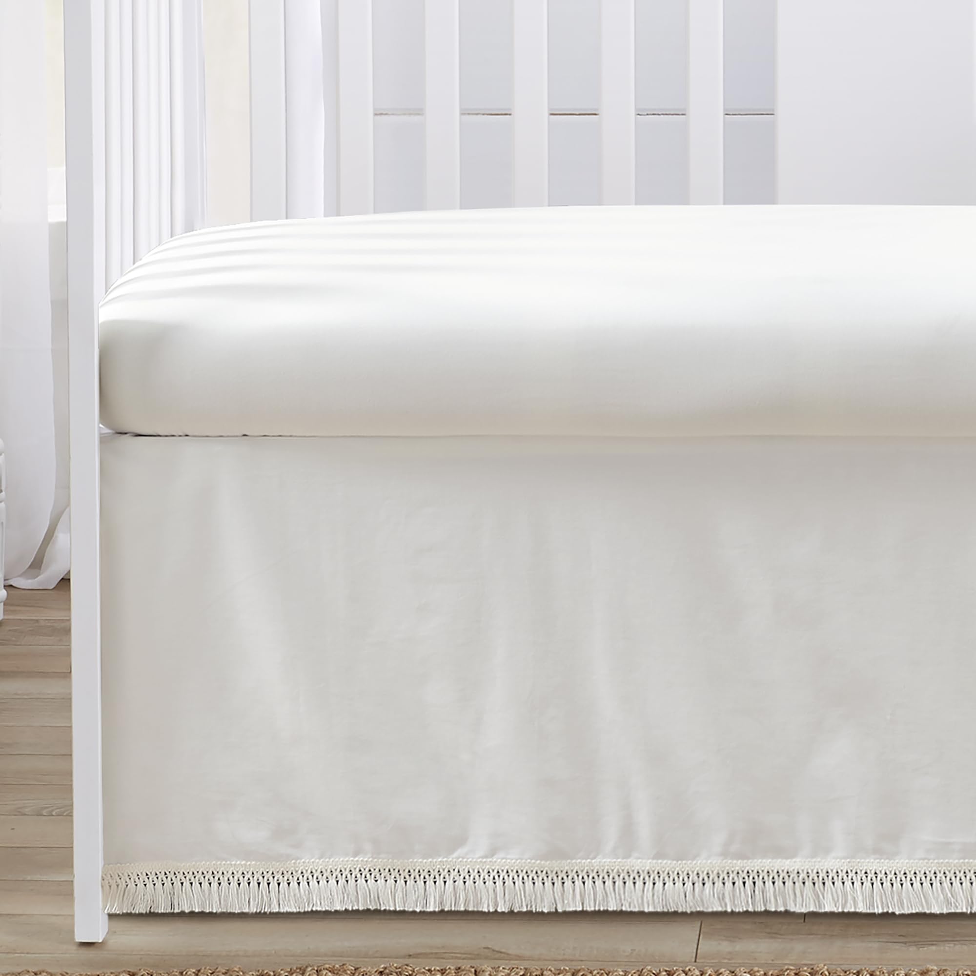 Sweet Jojo Designs macrame trim detail adds texture and craftsmanship.