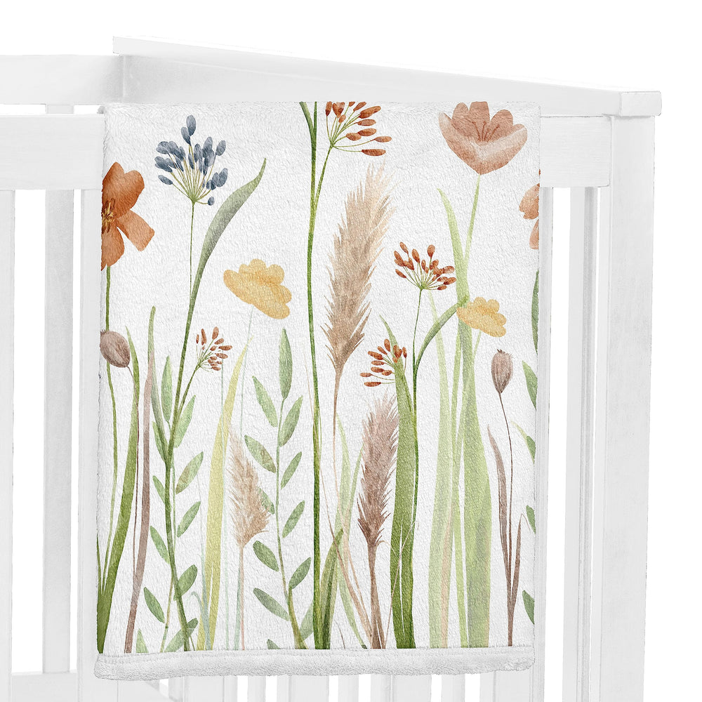 Sweet Jojo Designs milestone backdrop on baby demonstrates easy, repeatable photo setups.
