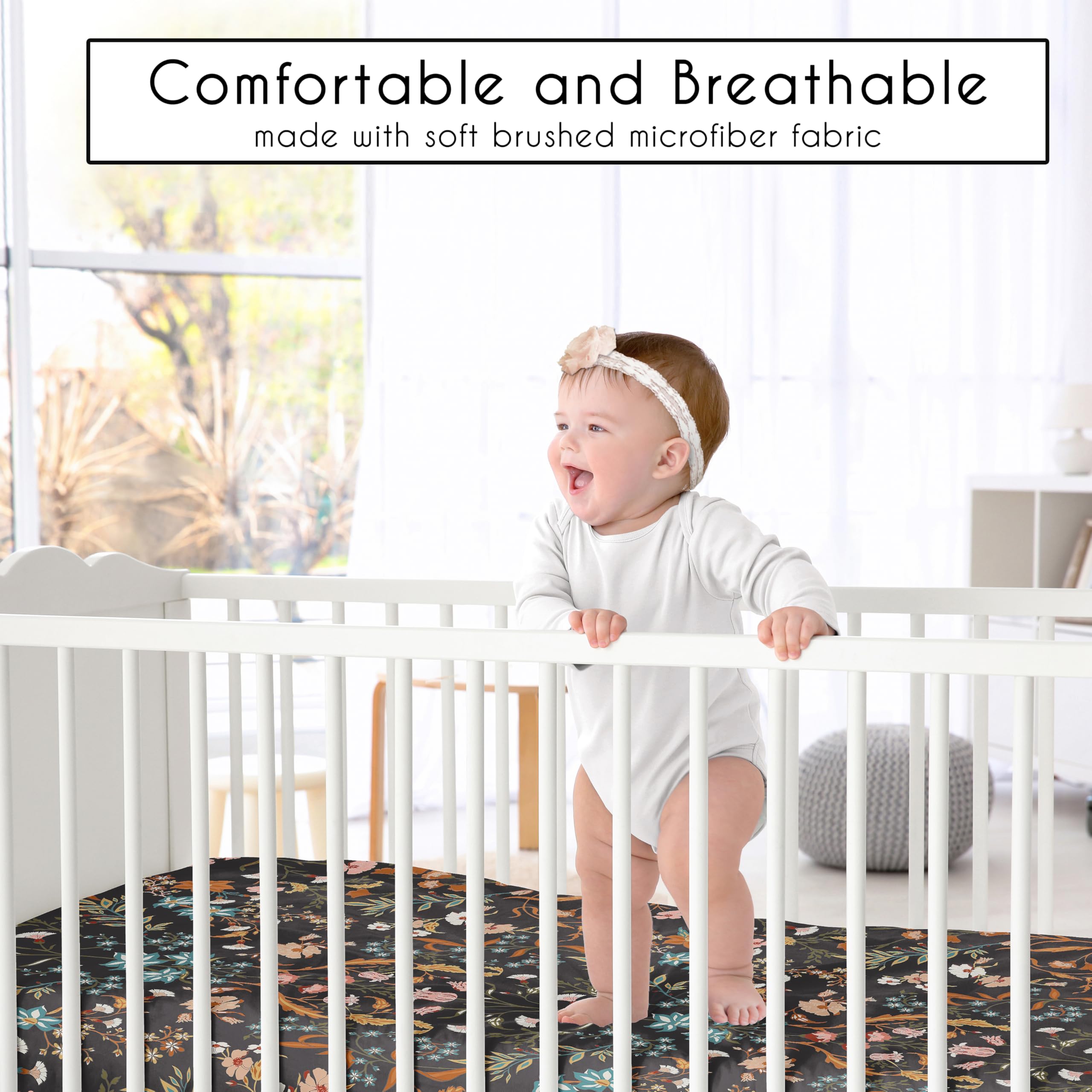 Sweet Jojo Designs mini crib sheet in black wildflower coordinates with boho nursery accents