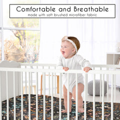 Sweet Jojo Designs mini crib sheet in black wildflower coordinates with boho nursery accents