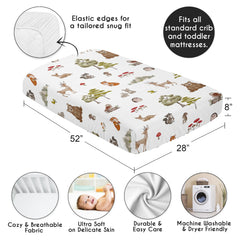 Sweet Jojo Designs neutral forest theme bedding creates a versatile nursery centerpiece for any gender.