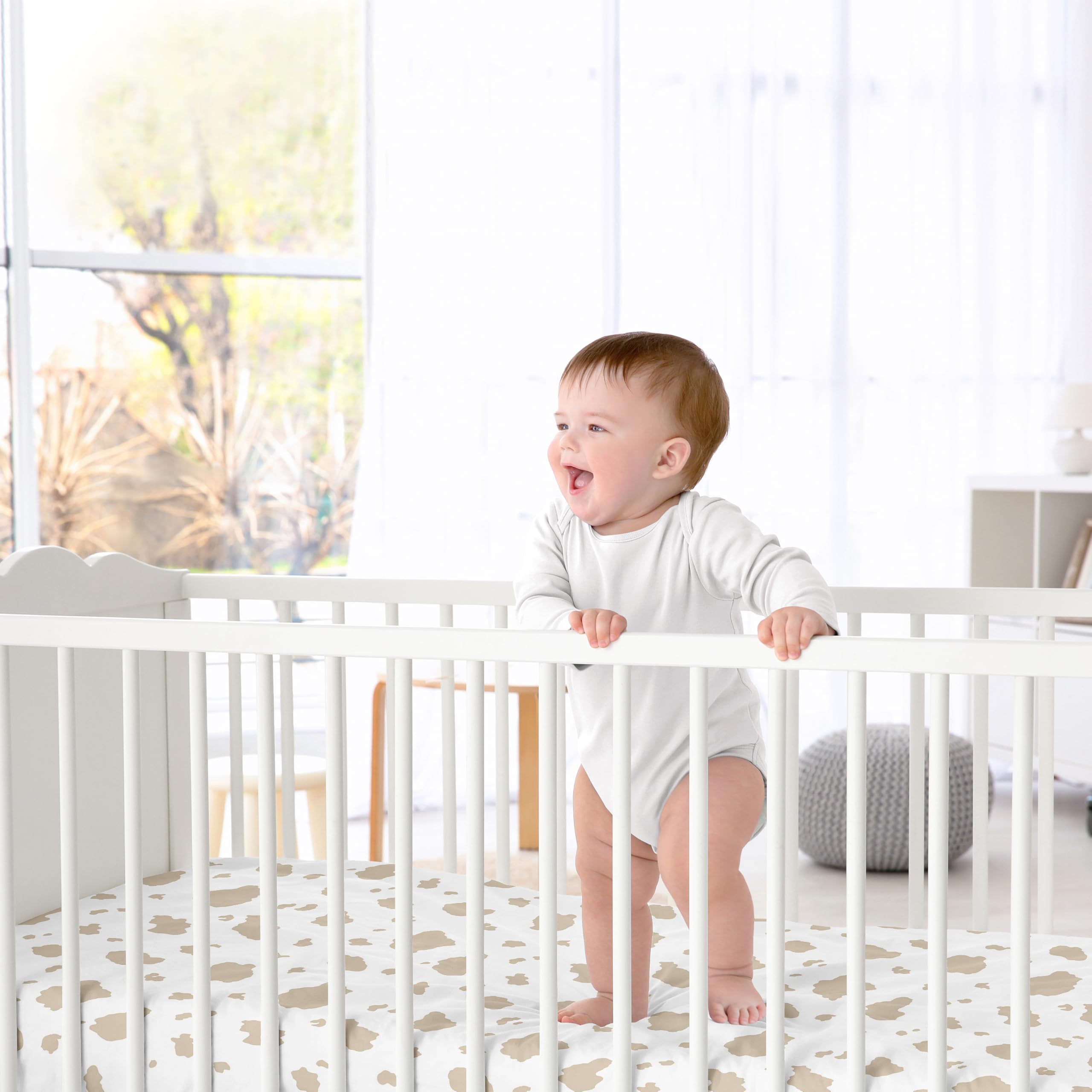 Sweet Jojo Designs nursery styling image showcases coordinating western theme with sheets.