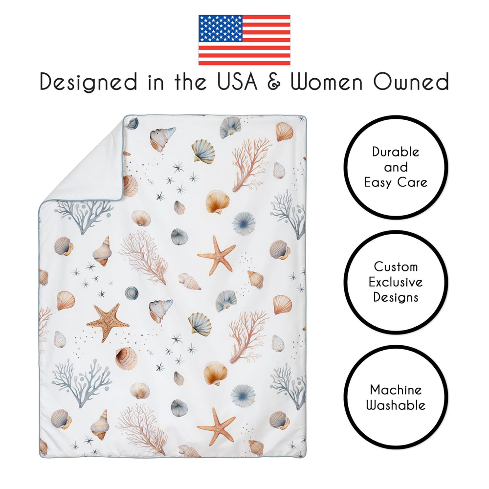 Sweet Jojo Designs Ocean Seashells diaper stacker keeps diapers organized and accessible