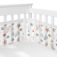 Sweet Jojo Designs Ocean Seashells long panel mesh crib liner keeps limbs inside for safety.