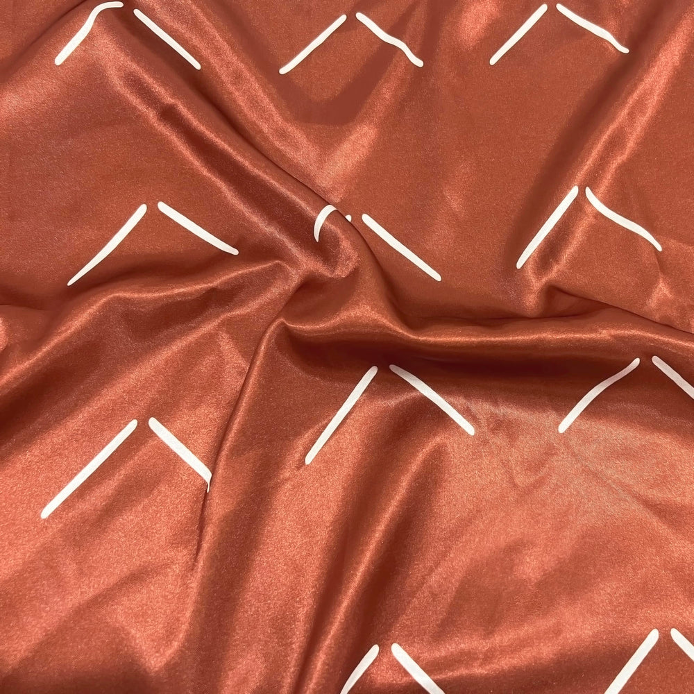 Sweet Jojo Designs satin crib sheet on a crib demonstrates secure fit with elastic bottom.