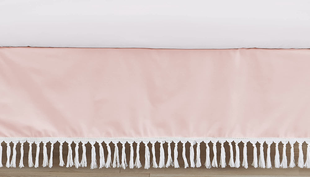 Sweet Jojo Designs pink boho crib skirt draped on a standard crib for a polished nursery.