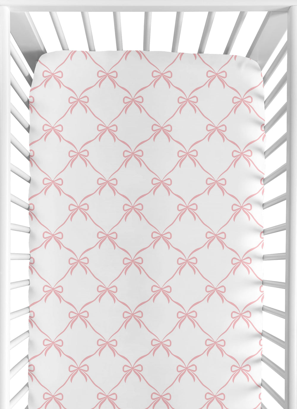 Sweet Jojo Designs pink bows crib sheet closeup; soft brushed microfiber for gentle sleep.