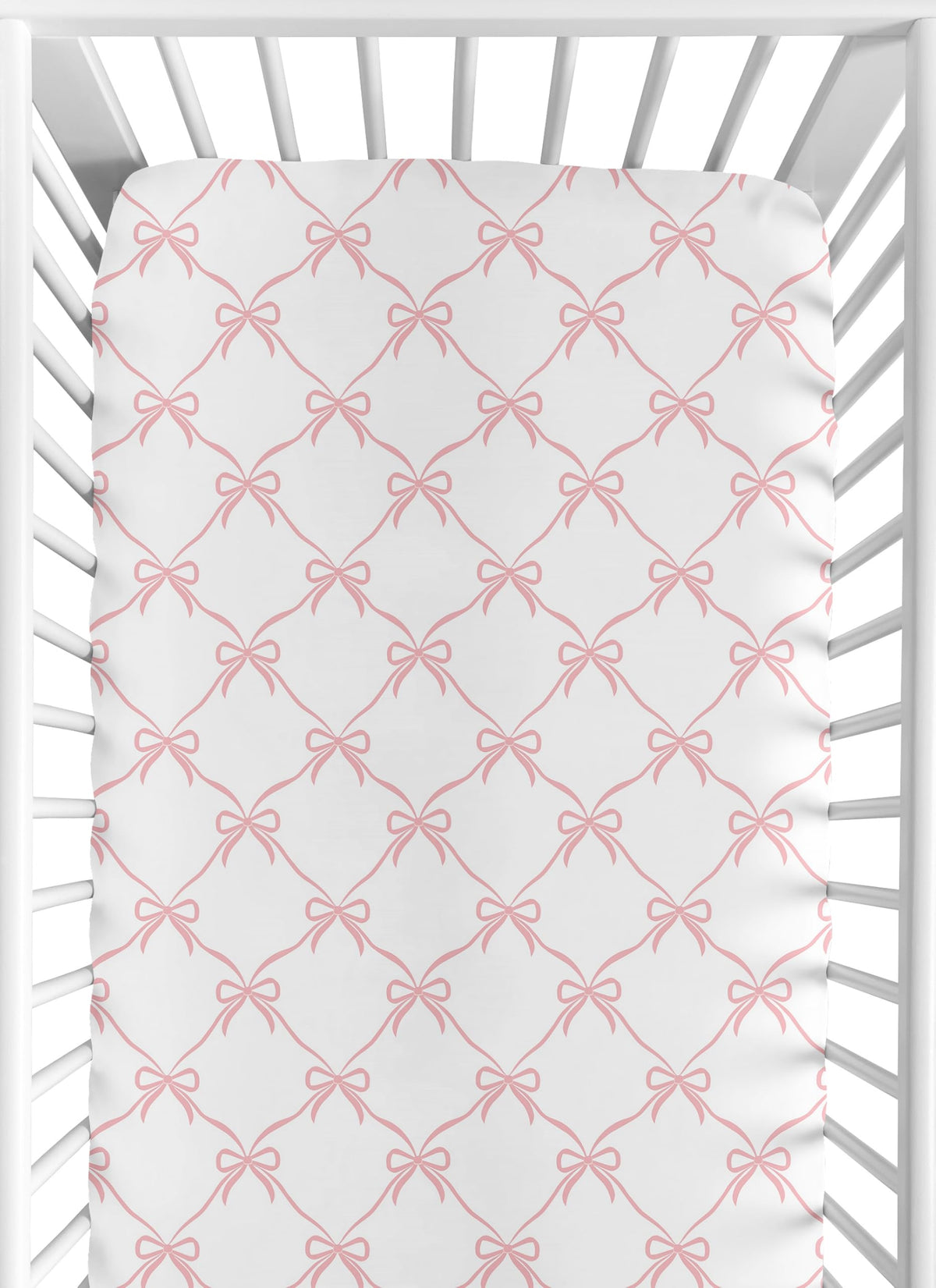 Sweet Jojo Designs pink bows crib sheet closeup; soft brushed microfiber for gentle sleep.